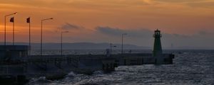 Preview wallpaper pier, lighthouse, sea, waves, sunset