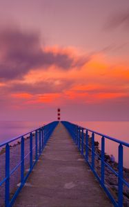 Preview wallpaper pier, lighthouse, sea, sunset, skyline, port-la-nouvelle, france