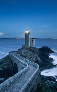 Preview wallpaper pier, lighthouse, sea, horizon, rocks