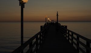 Preview wallpaper pier, lights, sea, dark