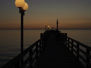 Preview wallpaper pier, lights, sea, dark
