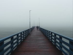 Preview wallpaper pier, man, alone, fog, sea