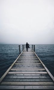 Preview wallpaper pier, man, sea, loneliness, horizon