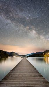 Preview wallpaper pier, mountains, lake, stars, night, dark