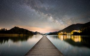 Preview wallpaper pier, mountains, lake, stars, night, dark