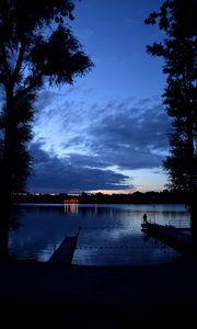 Preview wallpaper pier, night, river, silhouette, solitude