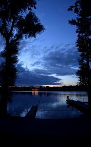 Preview wallpaper pier, night, river, silhouette, solitude