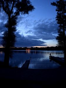 Preview wallpaper pier, night, river, silhouette, solitude