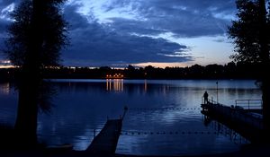 Preview wallpaper pier, night, river, silhouette, solitude