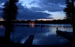 Preview wallpaper pier, night, river, silhouette, solitude