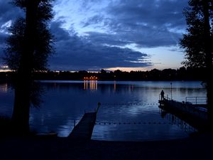 Preview wallpaper pier, night, river, silhouette, solitude