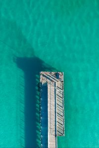 Preview wallpaper pier, ocean, shadow, top view, surface, turquoise