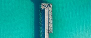 Preview wallpaper pier, ocean, shadow, top view, surface, turquoise