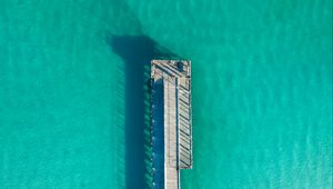 Preview wallpaper pier, ocean, shadow, top view, surface, turquoise