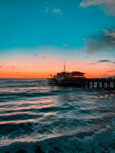 Preview wallpaper pier, ocean, surf, sunset, wave