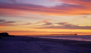 Preview wallpaper pier, pilings, sea, sunset, silhouette