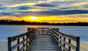Preview wallpaper pier, river, sunset, sun