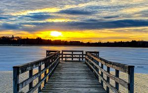 Preview wallpaper pier, river, sunset, sun