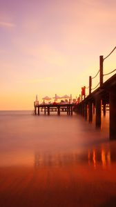 Preview wallpaper pier, river, sunset, landscape