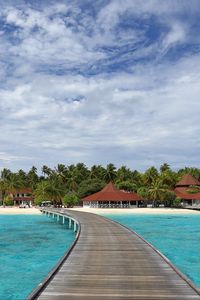 Preview wallpaper pier, sea, beach, palm trees, island