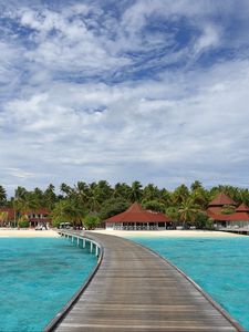 Preview wallpaper pier, sea, beach, palm trees, island