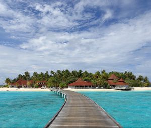 Preview wallpaper pier, sea, beach, palm trees, island