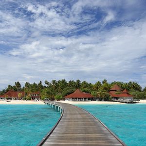 Preview wallpaper pier, sea, beach, palm trees, island