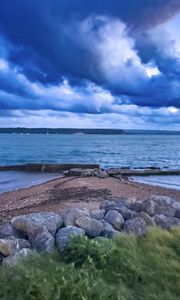 Preview wallpaper pier, sea, clouds, sky, stones