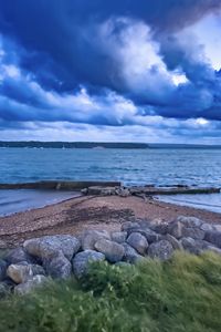 Preview wallpaper pier, sea, clouds, sky, stones