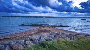 Preview wallpaper pier, sea, clouds, sky, stones