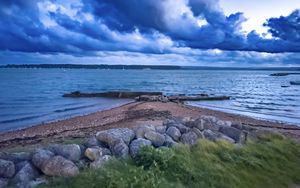 Preview wallpaper pier, sea, clouds, sky, stones