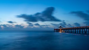 Preview wallpaper pier, sea, dusk, water, clouds