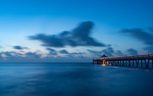 Preview wallpaper pier, sea, dusk, water, clouds