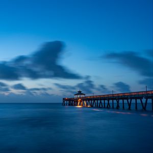 Preview wallpaper pier, sea, dusk, water, clouds