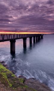 Preview wallpaper pier, sea, evening, clouds, stones, moss