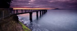 Preview wallpaper pier, sea, evening, clouds, stones, moss