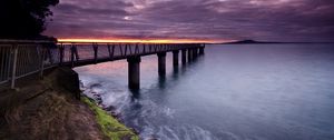 Preview wallpaper pier, sea, evening, clouds, stones, moss