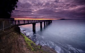 Preview wallpaper pier, sea, evening, clouds, stones, moss