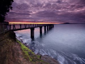 Preview wallpaper pier, sea, evening, clouds, stones, moss