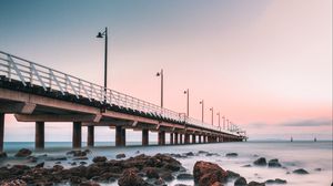 Preview wallpaper pier, sea, horizon, stones