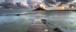 Preview wallpaper pier, sea, island, clouds, landscape