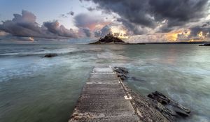 Preview wallpaper pier, sea, island, clouds, landscape