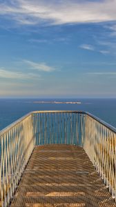 Preview wallpaper pier, sea, island, view, horizon