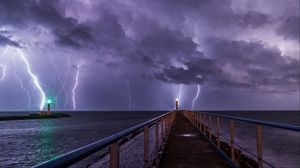 Preview wallpaper pier, sea, lighthouse, lightning, thunderstorm, dark
