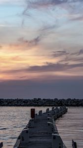 Preview wallpaper pier, sea, stones, horizon