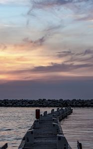 Preview wallpaper pier, sea, stones, horizon