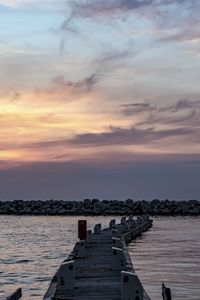 Preview wallpaper pier, sea, stones, horizon