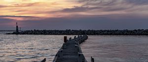 Preview wallpaper pier, sea, stones, horizon