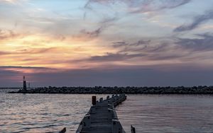 Preview wallpaper pier, sea, stones, horizon