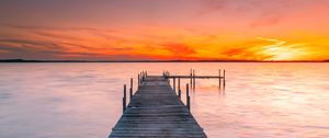 Preview wallpaper pier, sea, sunset, horizon, sky, water